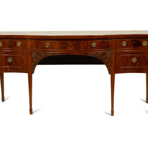 A George III Carved Mahogany Serpentine Front 2a8548