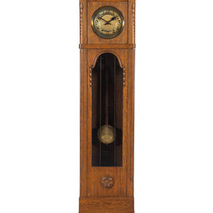 A Continental Oak Tall Case Clock
20th