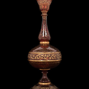 A Persian Market Gilt Decorated Cranberry