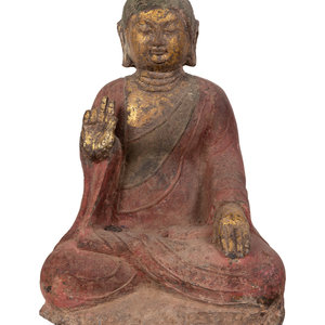 A Chinese Carved Stone Seated Buddha