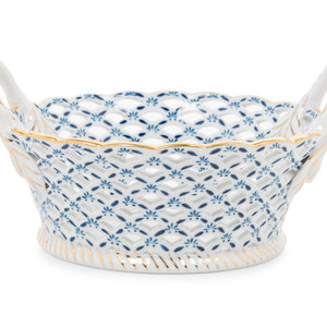 A Continental Porcelain Basket stamped 2a8b92