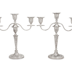A Pair of Silver Three-Light Candelabra
The