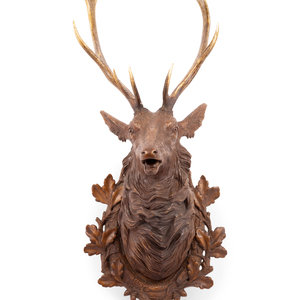 A Black Forest Carved Stag Head
19th