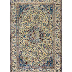A Nain Silk and Wool Blend Rug
Second