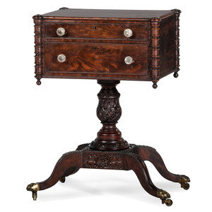 A Classical Carved and Figured Mahogany