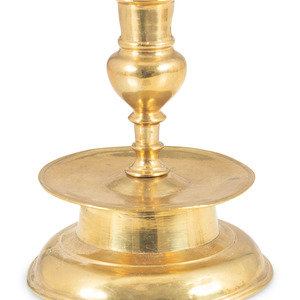 A Continental Brass Capstan Candlestick
Likely