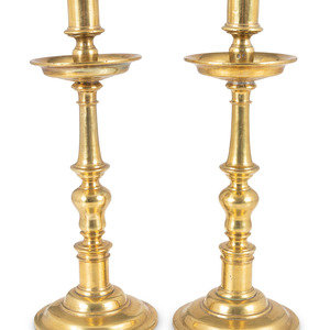 A Pair of Continental Brass Candlesticks
Likely