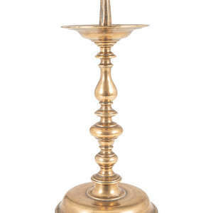 A Continental Brass Pricket Stick
Likely