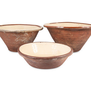 Three Redware Mixing Bowls
American,