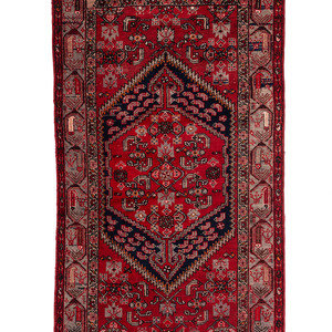 An Afghan Wool Rug
Second Half