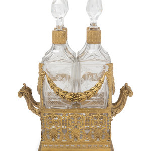 A French Gilt Metal and Glass Four-Bottle