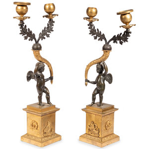 A Pair of Gilt and Patinated Bronze