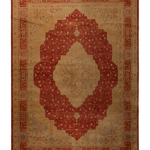 An Indo-Tabriz Wool Rug
Late 20th