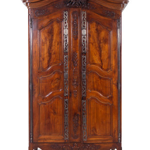 A Louis XV Provincial Carved Walnut