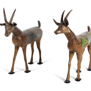 A Pair of Indian Painted Wood Models