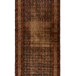 A Heriz Wool Rug
Circa 1940
9 feet 10