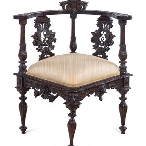 A Renaissance Revival Carved Walnut