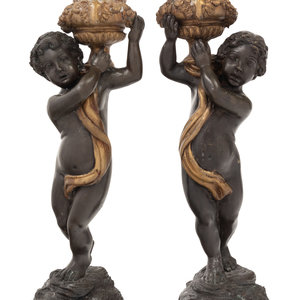 A Pair of Gilt and Patinated Bronze
