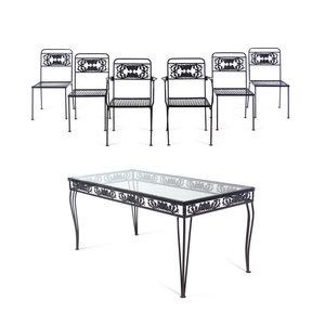 A Metal Garden Dining Table and Six