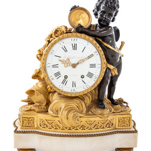 A Louis XVI Style Gilt and Patinated