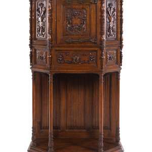 A Gothic Revival Carved Oak Cabinet 2aa56a