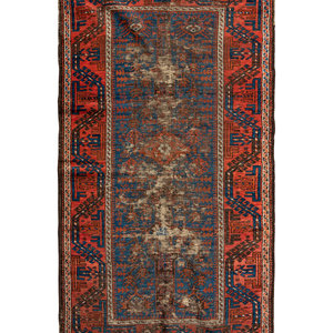 A Baluchi Wool Rug
Circa 1870
5