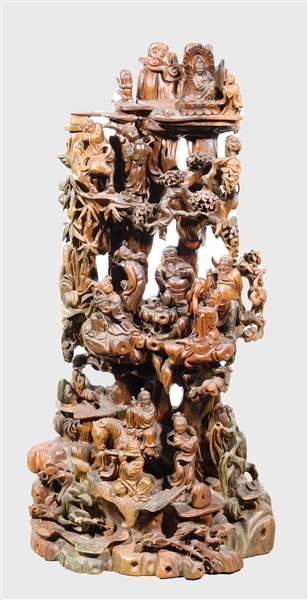 Carved Chinese figural statue depicting
