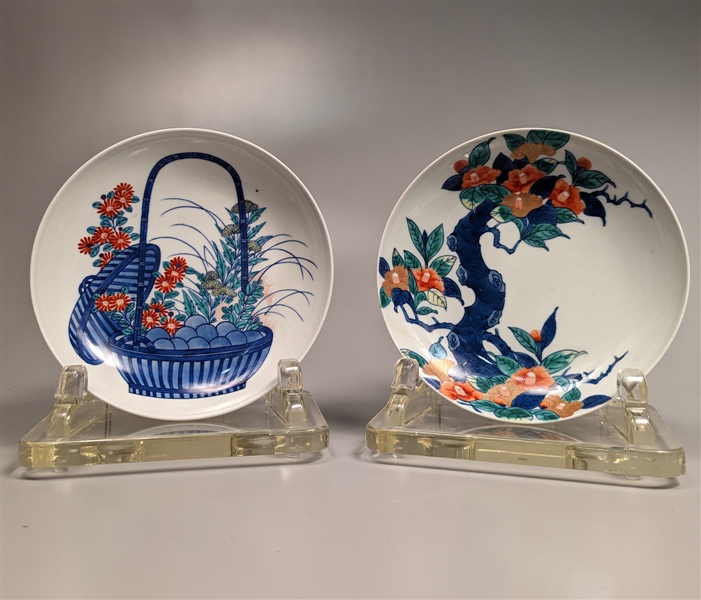 Two heavy Japanese porcelain dishes;