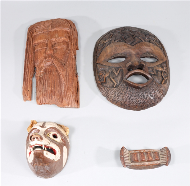 Group of four ethnographic carvings,