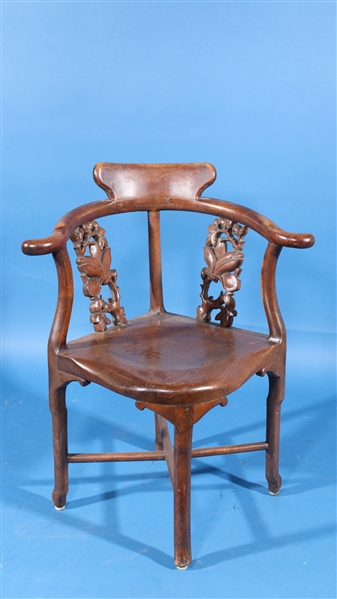 Chinese wood chair with carved magnolia