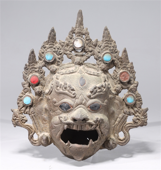 Antique Indonesian metal mask with 2aa8ab