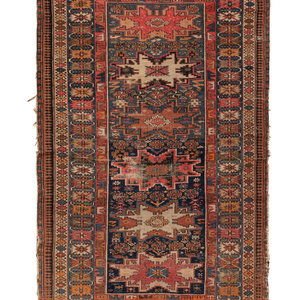 A Caucasian Shirvan Lesghi Wool Rug
Circa