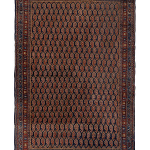 A Persian Boteh Design Rug
Circa