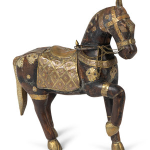 A Moroccan Carved Wood and Brass Horse
20TH