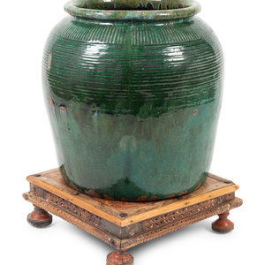 A French Green-Glazed Pottery Jardiniere
with