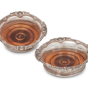 A Pair of English Silver Wine Coasters
Roberts