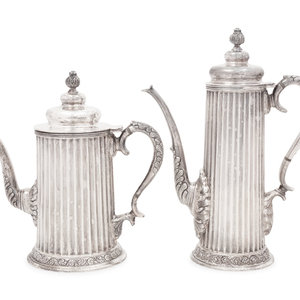 A Mexican Silver Teapot and Coffee Pot
Tane