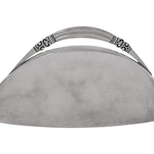 A Georg Jensen Silver Crumb Scoop
Design