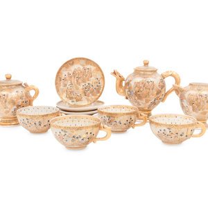 A Satsuma Porcelain Tea Service
comprising