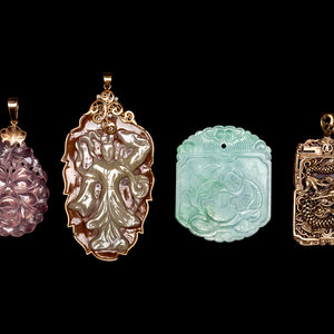 Four Chinese Pendants
comprising