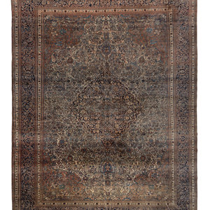 A Kirman Wool Rug
Circa 1910
16