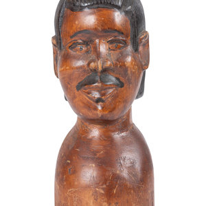 A Carved and Painted Wood Bust