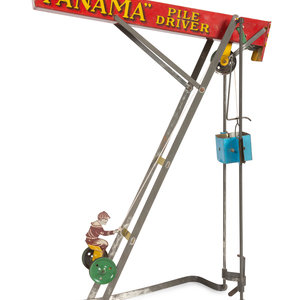 A Panama Pile Driver Tin Toy Wolverine 2a9471