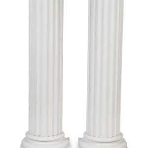 A Pair of Painted Wood Columnar