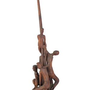 A Folk Art Carved Wood Figural