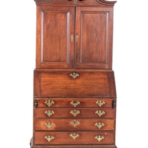 A Chippendale Carved and Paneled