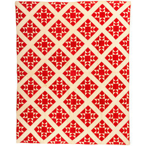 A Red and White Diamond Cross Quilt
American,