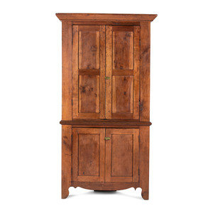 A Chippendale Paneled Cherrywood