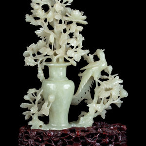 A Chinese Carved Celadon Jade Flower 2a9abb