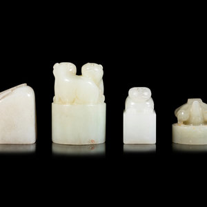 Four Chinese Celadon Jade Seals
comprising